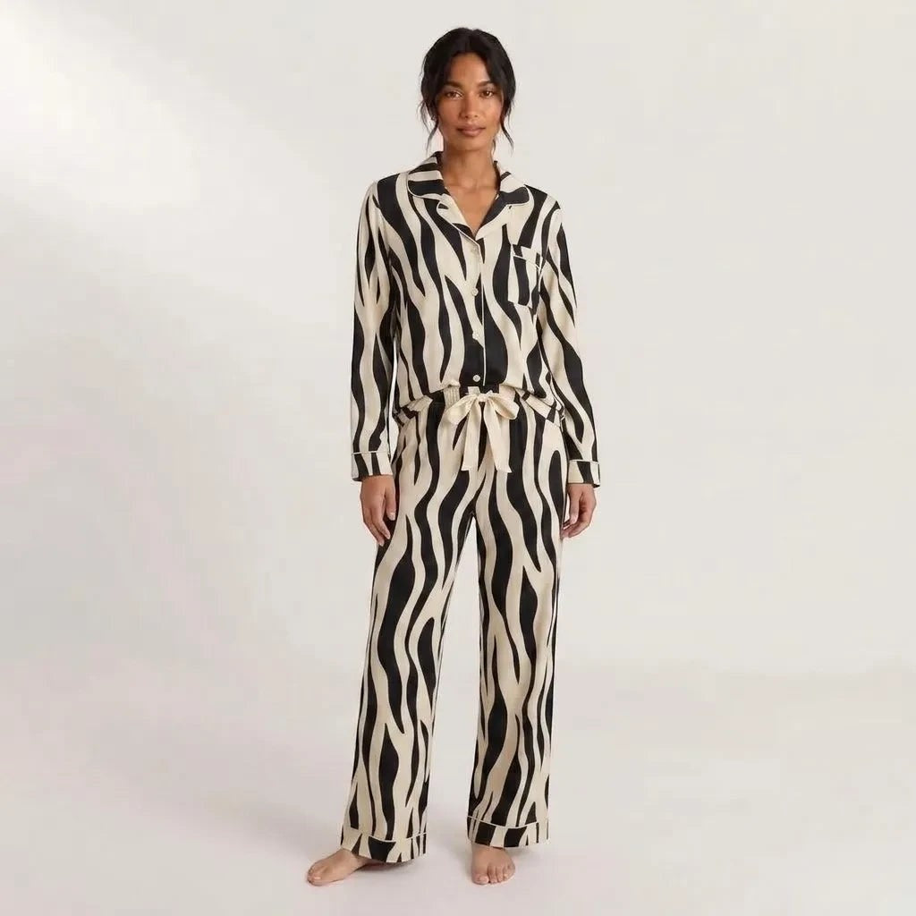 Stay In Society zebra print long sleeve button down pajama set with notched collar and drawstring wide-leg trousers