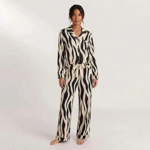 Stay In Society zebra print long sleeve button down pajama set with notched collar and drawstring wide-leg trousers